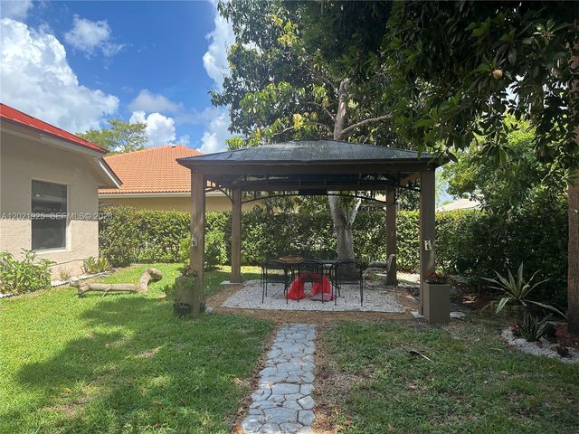 115 Kapok Crescent, Royal Palm Beach, FL 33411