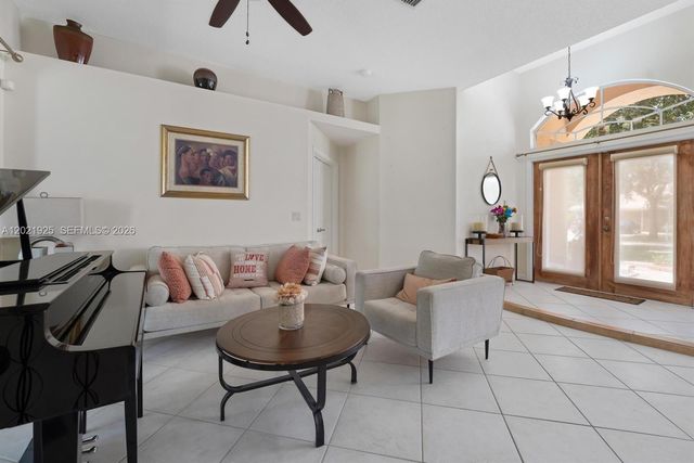 115 Kapok Crescent, Royal Palm Beach, FL 33411