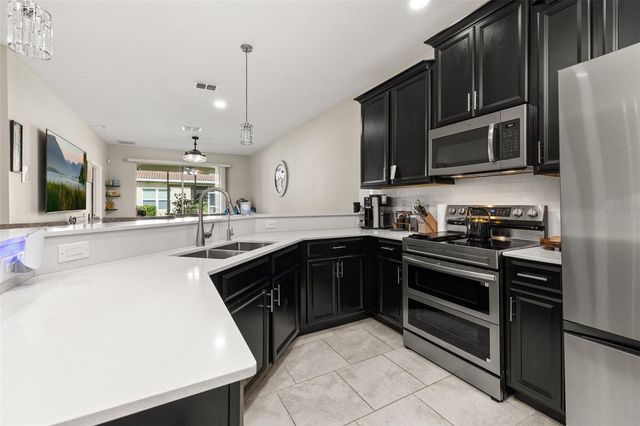 1060 BLACKWOLF RUN ROAD, Davenport, FL 33896