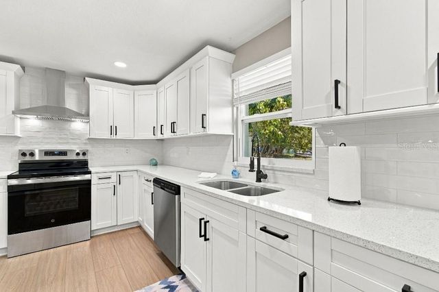 10744 DRUMMOND ROAD, Tampa, FL 33615