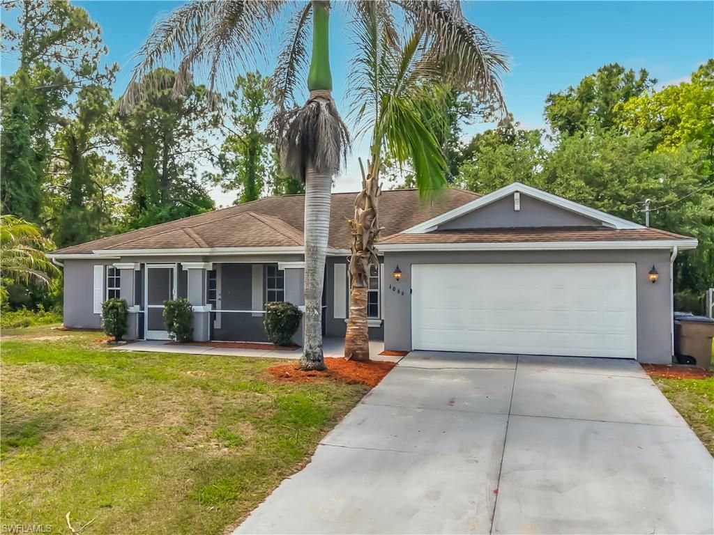 1066 Summa BLVD, LEHIGH ACRES, FL 33974 — exterior