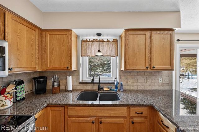 1408 Morning Mist Drive, Howell, MI 48843