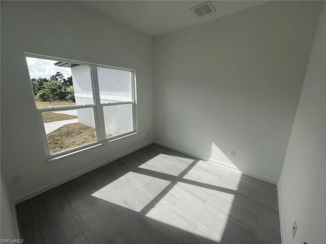 940 Sterling ST E, Lehigh Acres, FL 33974