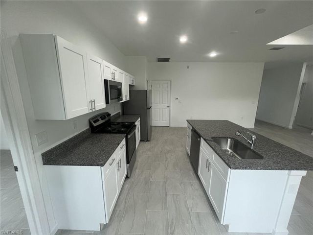 940 Sterling ST E, Lehigh Acres, FL 33974