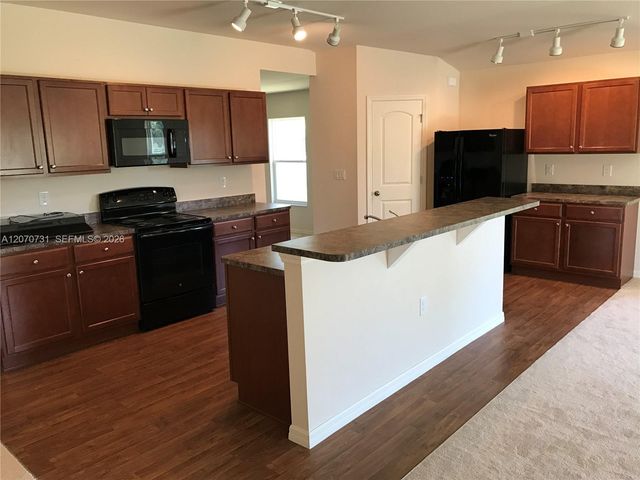 10408 Canal Brook Lane 10408, Lehigh Acres, FL 33936