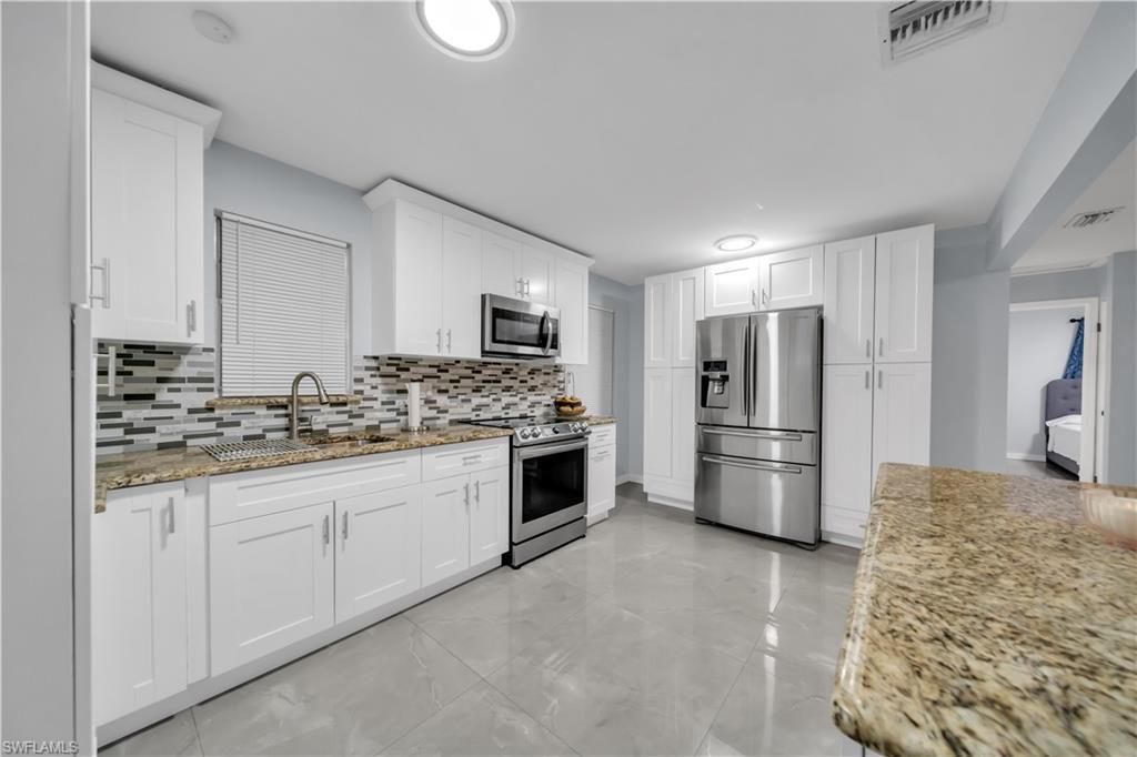 77 Glenmont DR W, NORTH FORT MYERS, FL 33917 — photo 5