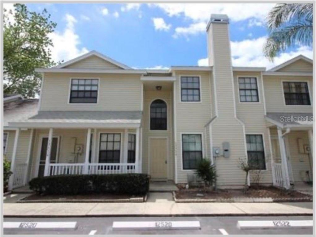 Image 1 of property listing at 12522 CASTLE HILL DRIVE, Tampa, FL 33624