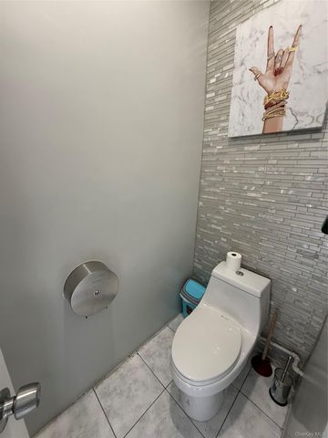 6073 Fresh Pond Road, Maspeth, NY 11378