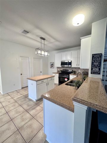 9942 Lynette Falls Drive, Houston, TX 77095