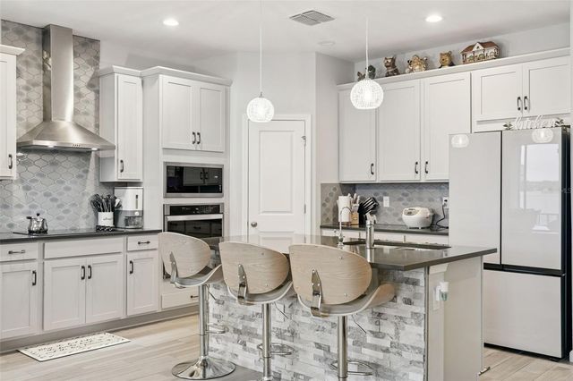 4465 DAVOS DRIVE, Clermont, FL 34711