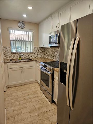 250 Layne Blvd 105, Hallandale Beach, FL 33009