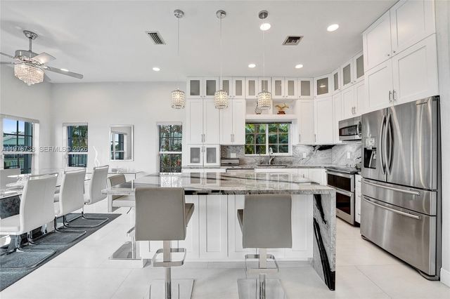 1078 Laguna Springs Dr, Weston, FL 33326