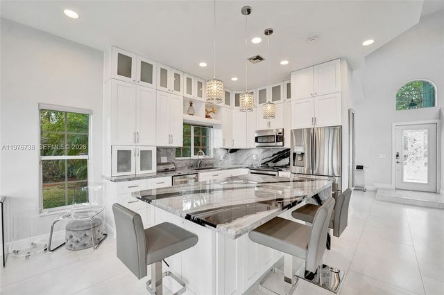 1078 Laguna Springs Dr, Weston, FL 33326