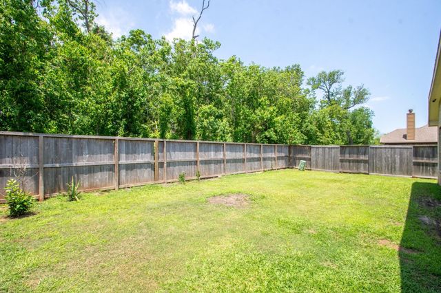 208 Timber Grove Court, Clute, TX 77531