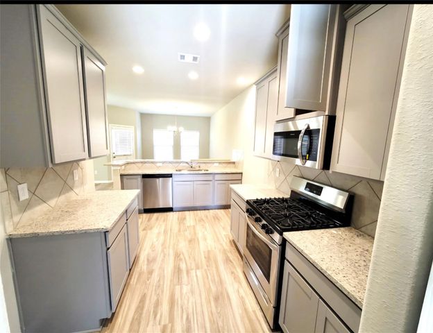 6543 Macroom Meadows Lane, Houston, TX 77048