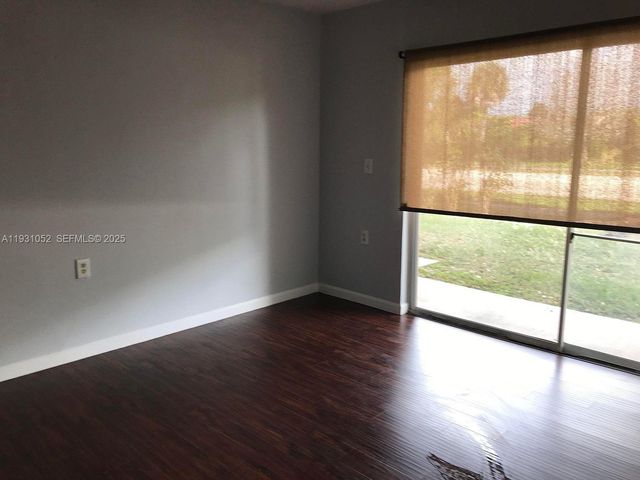 1133 N Benoist Farms Rd 103, West Palm Beach, FL 33411