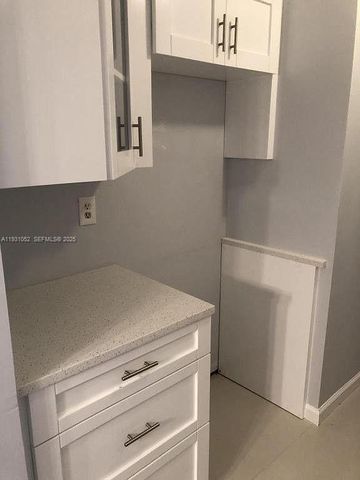 1133 N Benoist Farms Rd 103, West Palm Beach, FL 33411