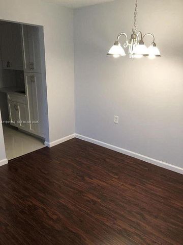 1133 N Benoist Farms Rd 103, West Palm Beach, FL 33411