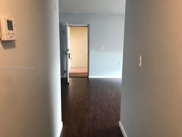 1133 N Benoist Farms Rd 103, West Palm Beach, FL 33411