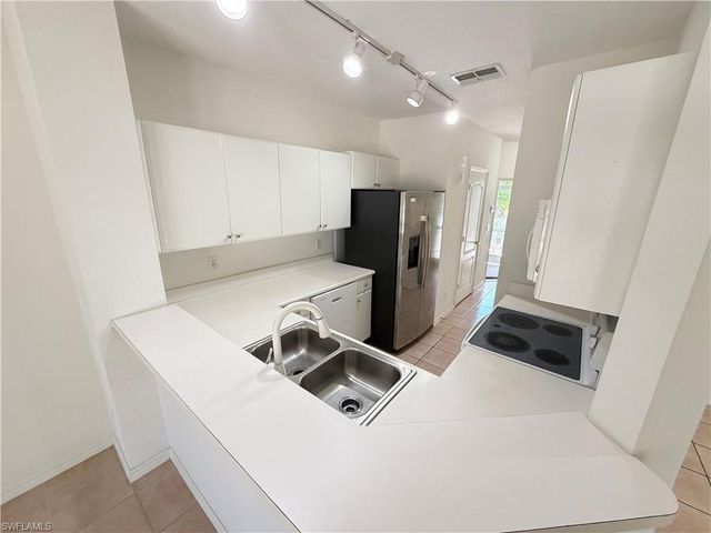 8541 Athena CT, Lehigh Acres, FL 33971