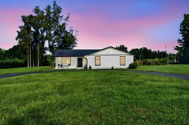 5989 COCONUT Boulevard, The Acreage, FL 33411