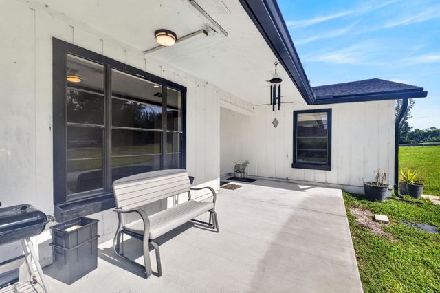 5989 COCONUT Boulevard, The Acreage, FL 33411