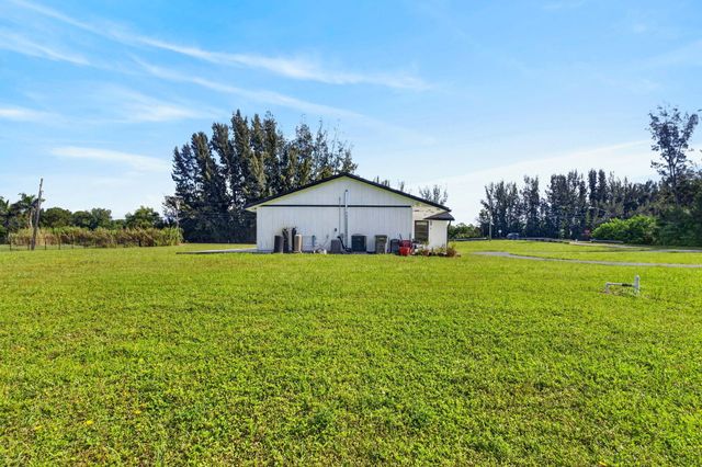 5989 COCONUT Boulevard, The Acreage, FL 33411