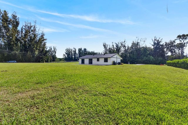 5989 COCONUT Boulevard, The Acreage, FL 33411