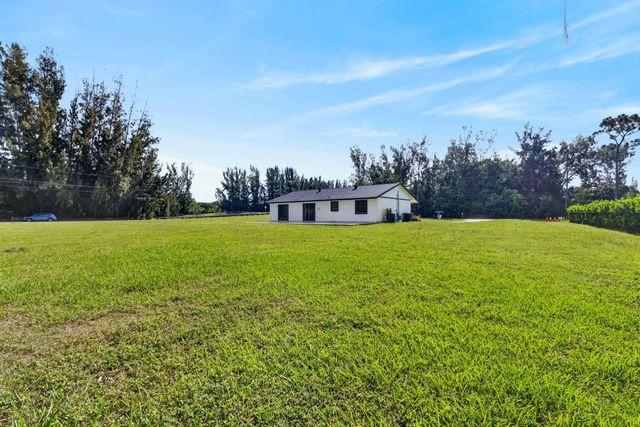 5989 COCONUT Boulevard, The Acreage, FL 33411