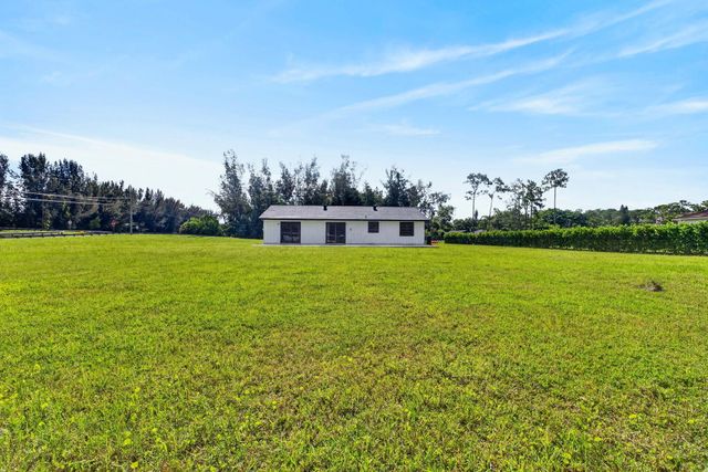 5989 COCONUT Boulevard, The Acreage, FL 33411