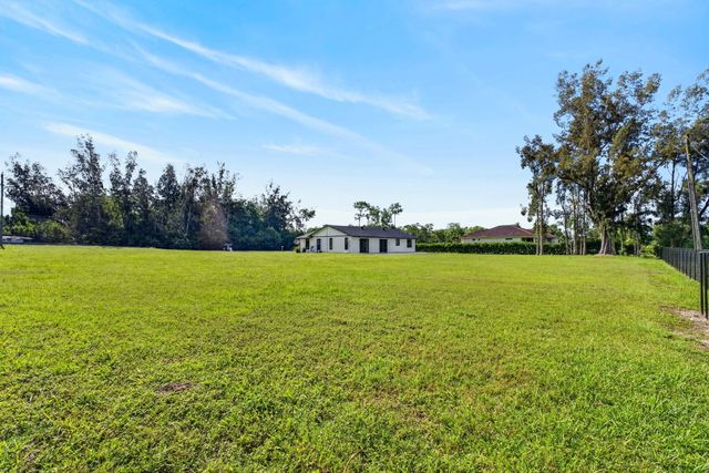 5989 COCONUT Boulevard, The Acreage, FL 33411