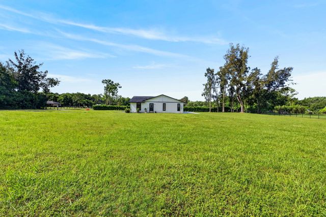 5989 COCONUT Boulevard, The Acreage, FL 33411