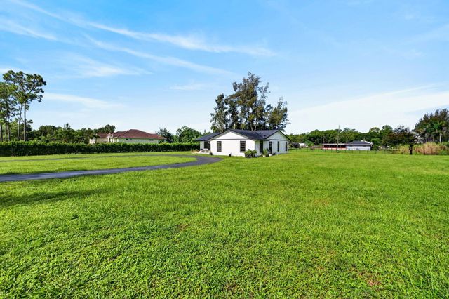 5989 COCONUT Boulevard, The Acreage, FL 33411
