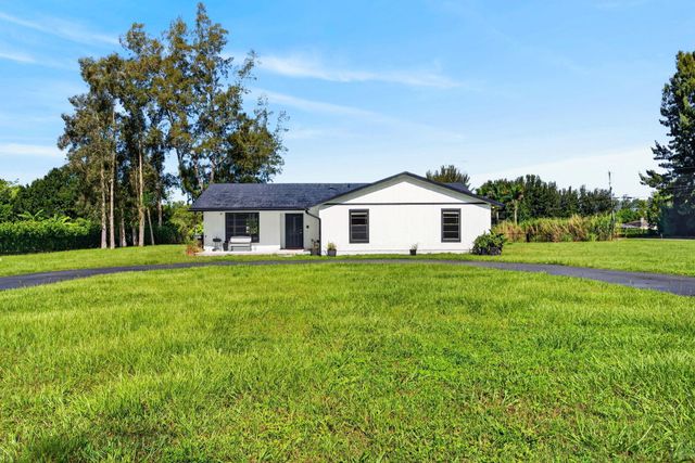 5989 COCONUT Boulevard, The Acreage, FL 33411