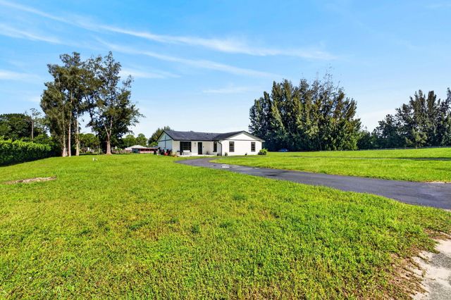 5989 COCONUT Boulevard, The Acreage, FL 33411