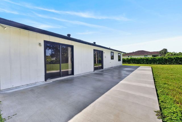 5989 COCONUT Boulevard, The Acreage, FL 33411