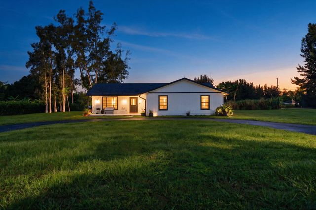 5989 COCONUT Boulevard, The Acreage, FL 33411