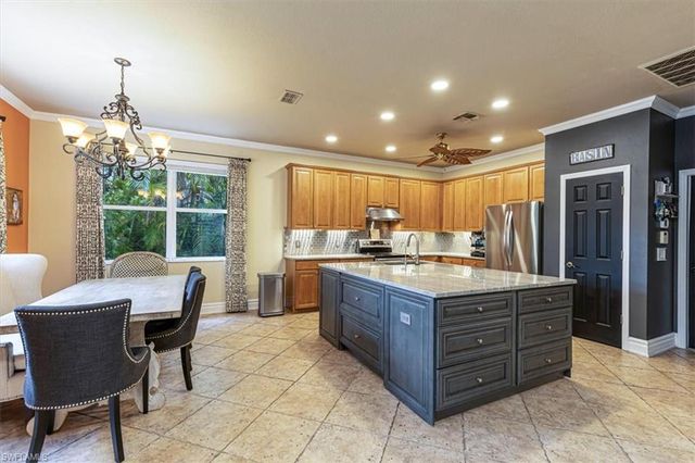 120 Burnt Pine DR, Naples, FL 34119