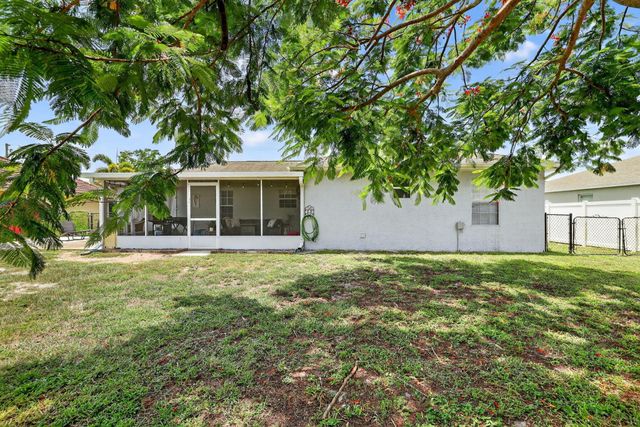 831 SW Mccoy Avenue, Port St Lucie, FL 34953