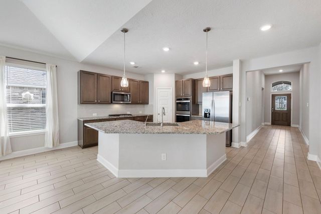 8731 Ute Creek Lane, Magnolia, TX 77354