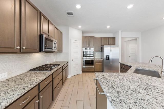 8731 Ute Creek Lane, Magnolia, TX 77354