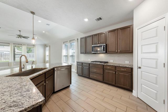 8731 Ute Creek Lane, Magnolia, TX 77354