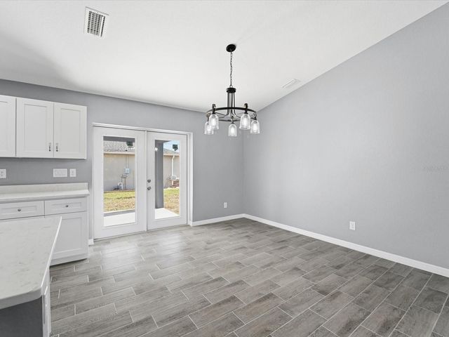 12081 SNOW BIRD AVENUE, Port Charlotte, FL 33981