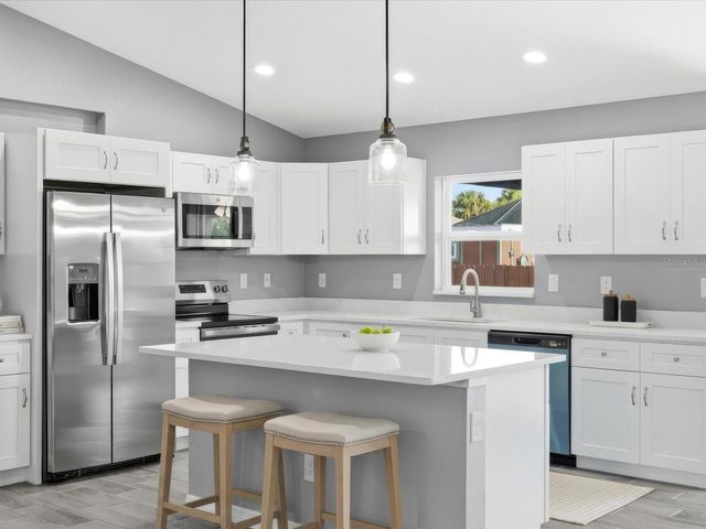 12081 SNOW BIRD AVENUE, Port Charlotte, FL 33981