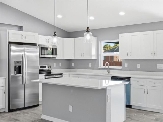 12081 SNOW BIRD AVENUE, Port Charlotte, FL 33981