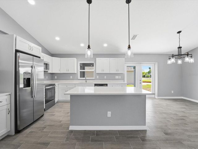 12081 SNOW BIRD AVENUE, Port Charlotte, FL 33981