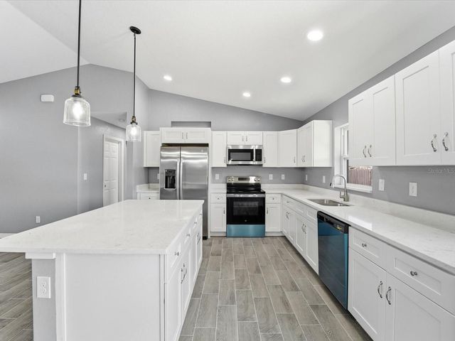 12081 SNOW BIRD AVENUE, Port Charlotte, FL 33981