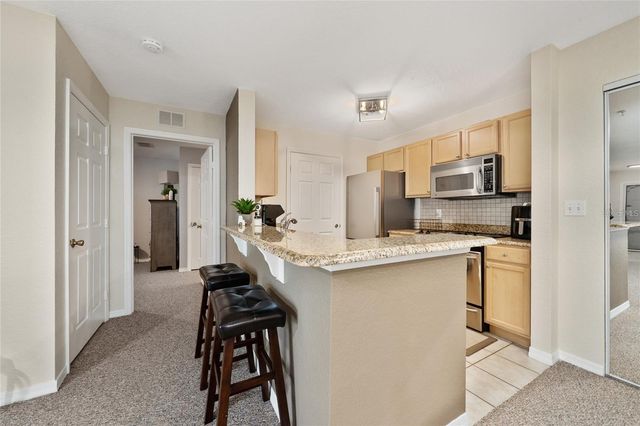 930 MOONLIGHT COVE ROAD 11-107, Orange City, FL 32763