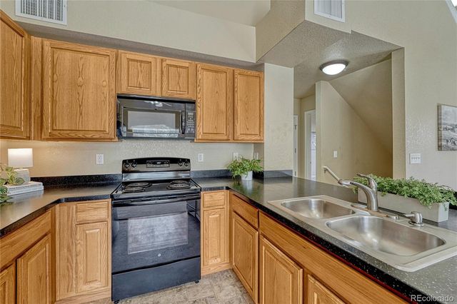 9585 Pearl Circle 203, Parker, CO 80134