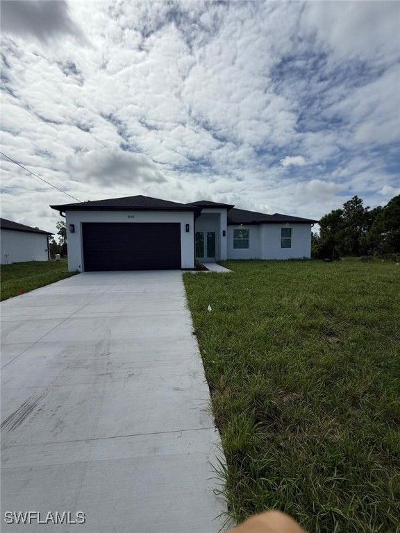 848 Amigo ST E, Lehigh Acres, FL 33974